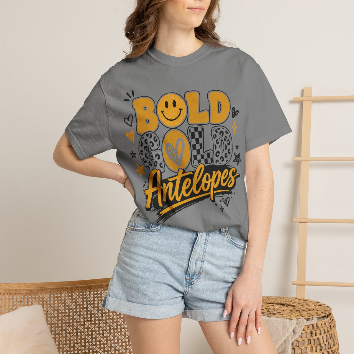 Bold Gold Antelopes Graphic T-Shirt — Cheerful Retro Smile Design