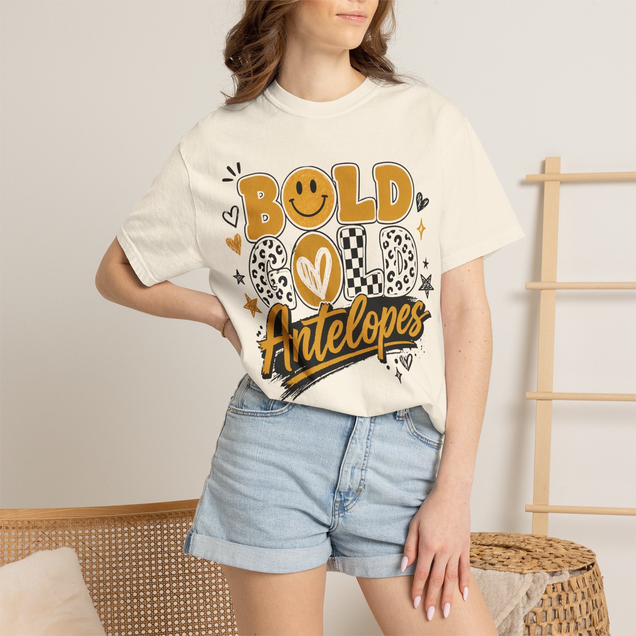 Bold Gold Antelopes Graphic T-Shirt — Cheerful Retro Smile Design